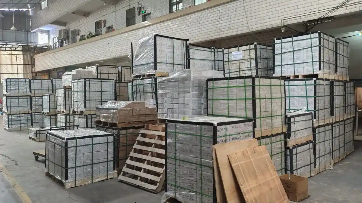 Pallets of boxed tile stacked in the LSDECO warehouse in Foshan