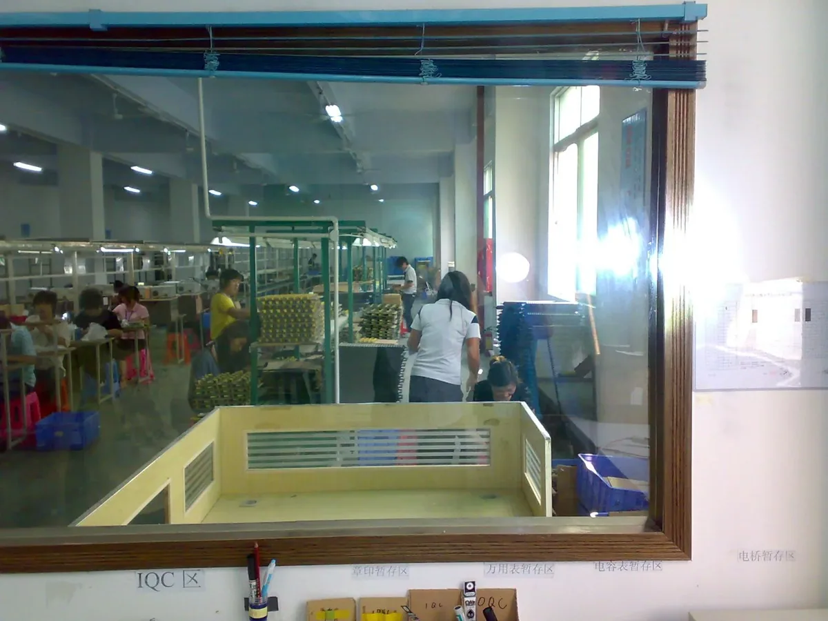 IQC station overlooking the assembly floor, where incoming components are checked.