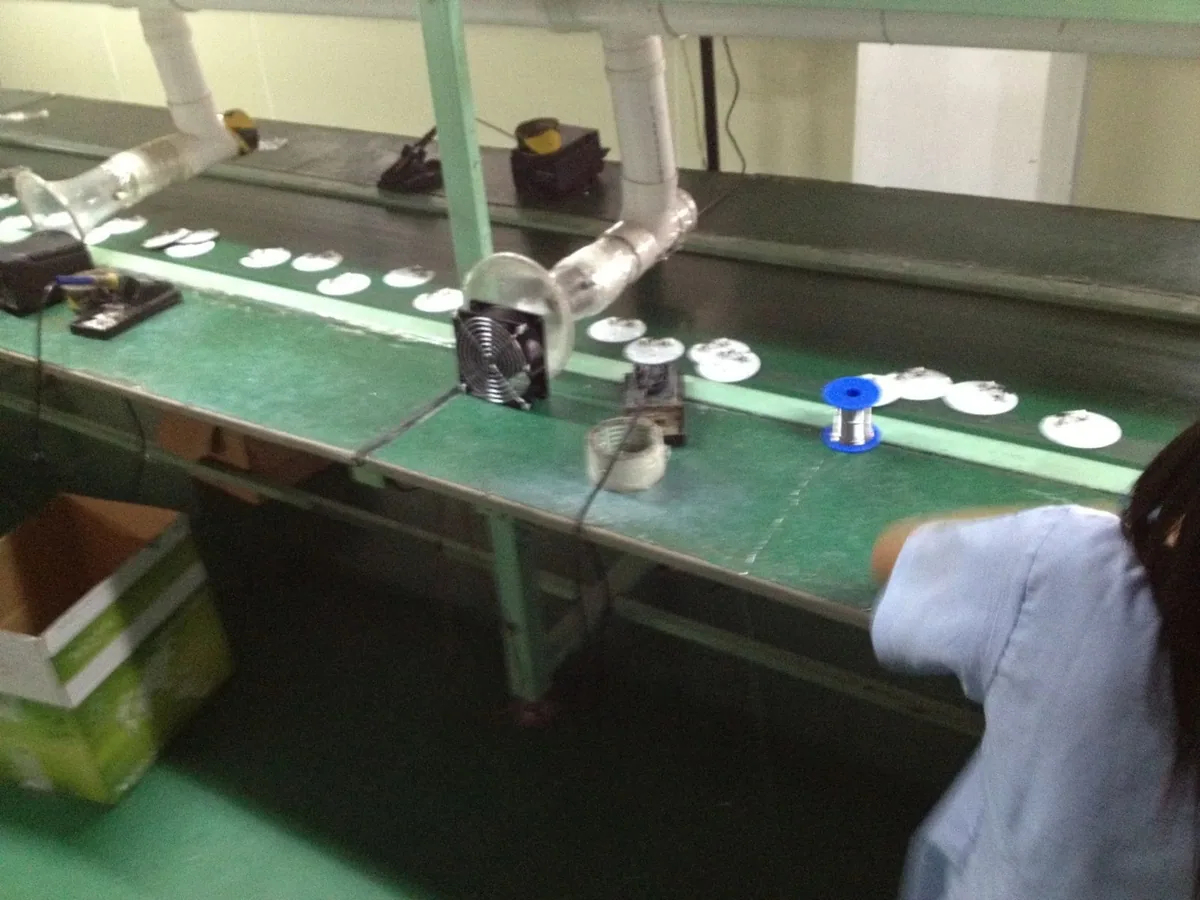 Hand soldering and sub-assembly bench with extraction over each station.