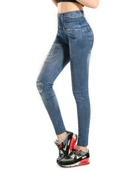 Blue washed denim look jean-legging shown full length on a model
