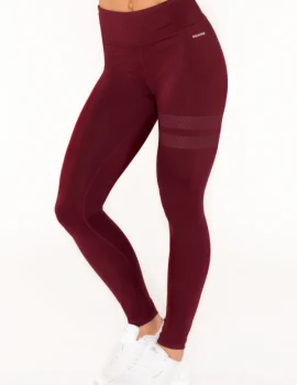 Black yoga leggings XH-YL034 shown full length on a model in a seated yoga pose