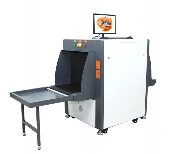 XIBS 6550A machine with conveyor and exit tray