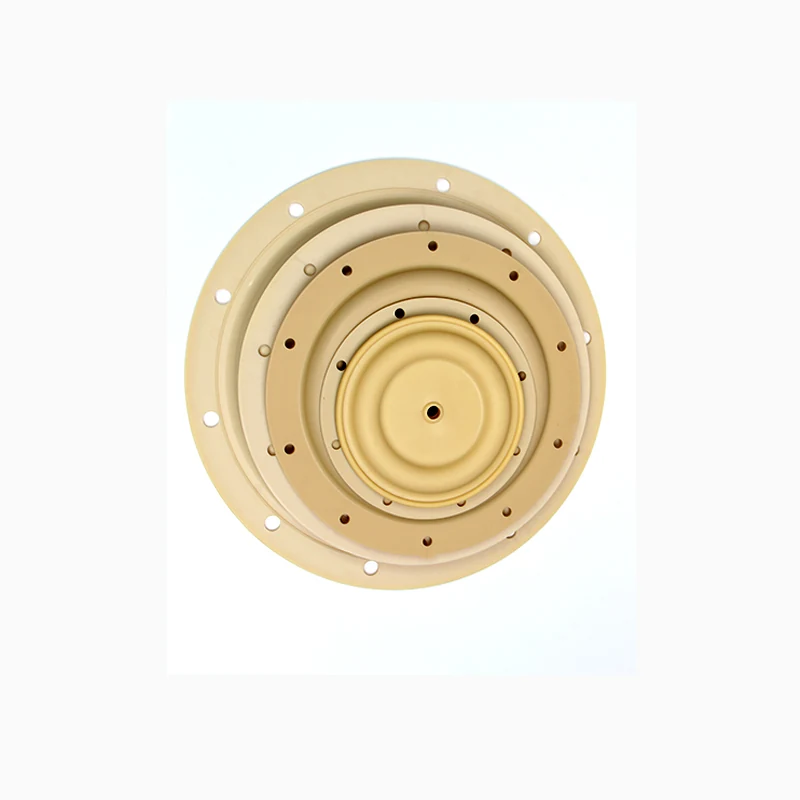 Top-down view of a circular metallic component with concentric rings and mounting holes