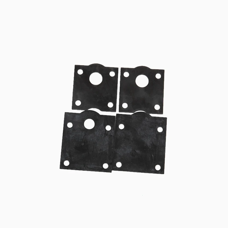 Four black square rubber gaskets with a central hole and four corner holes
