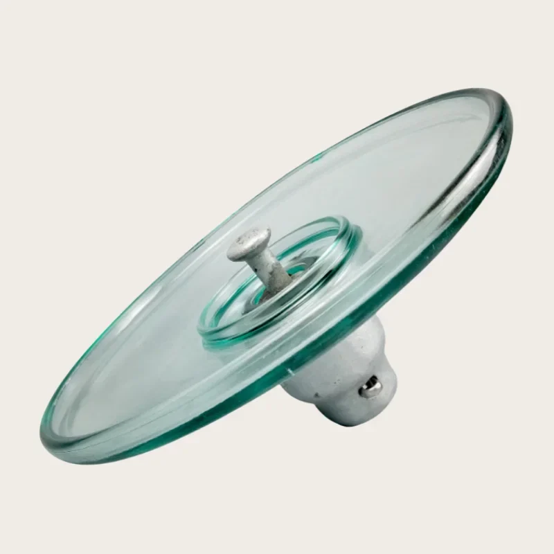 Aerodynamic glass insulator cap and ball coupling detail