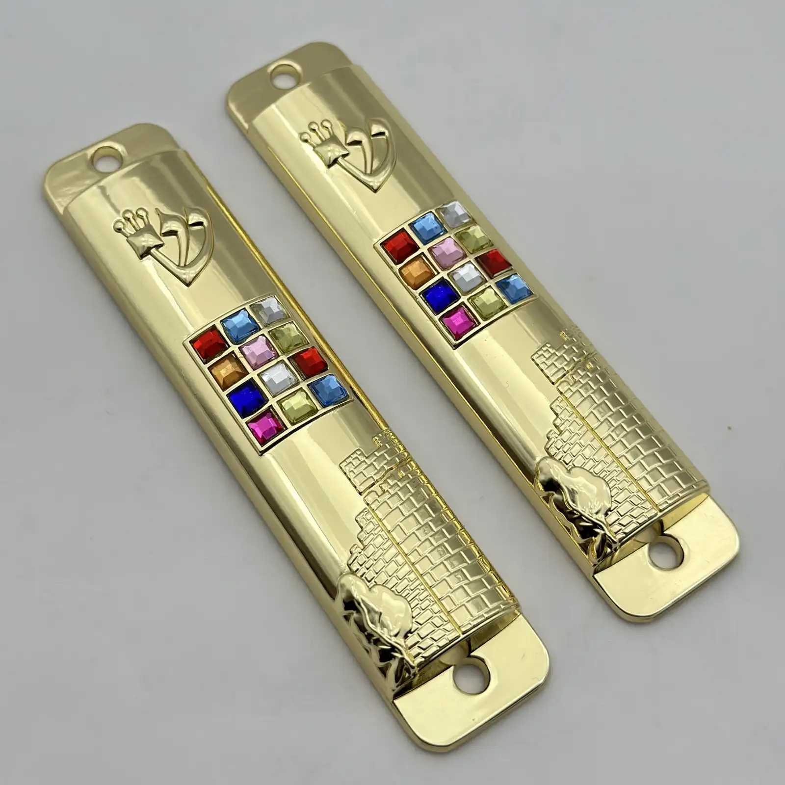 Twelve breastplates mezuzah shown from the front