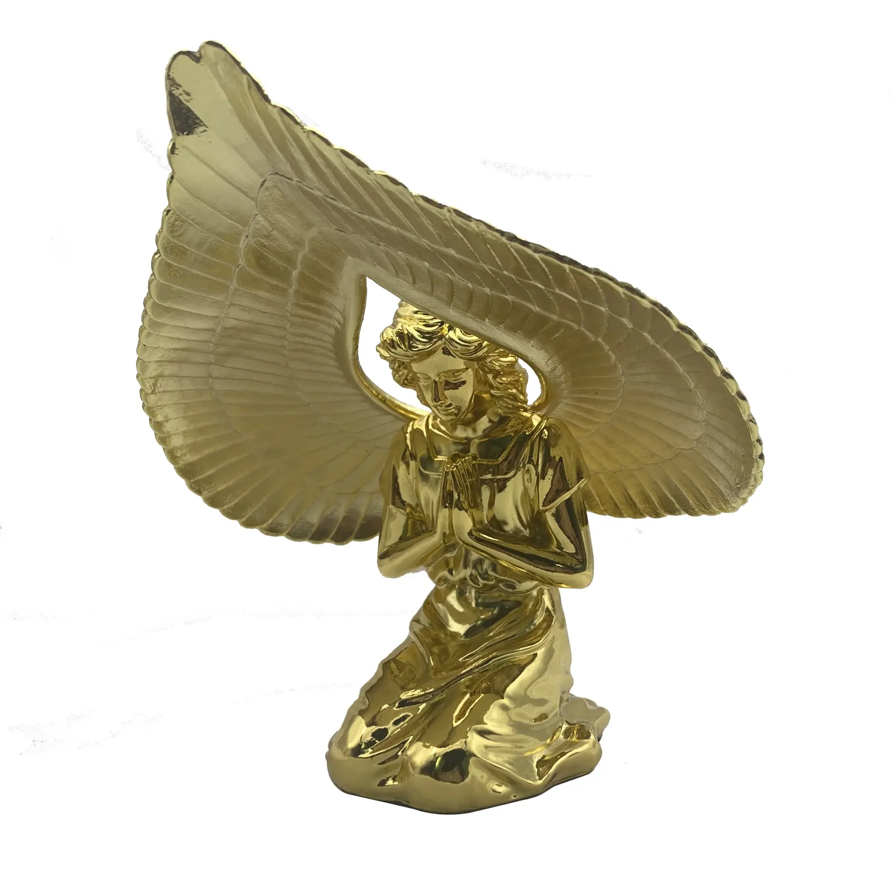 Side view of the gold plated angel figure showing wing detail