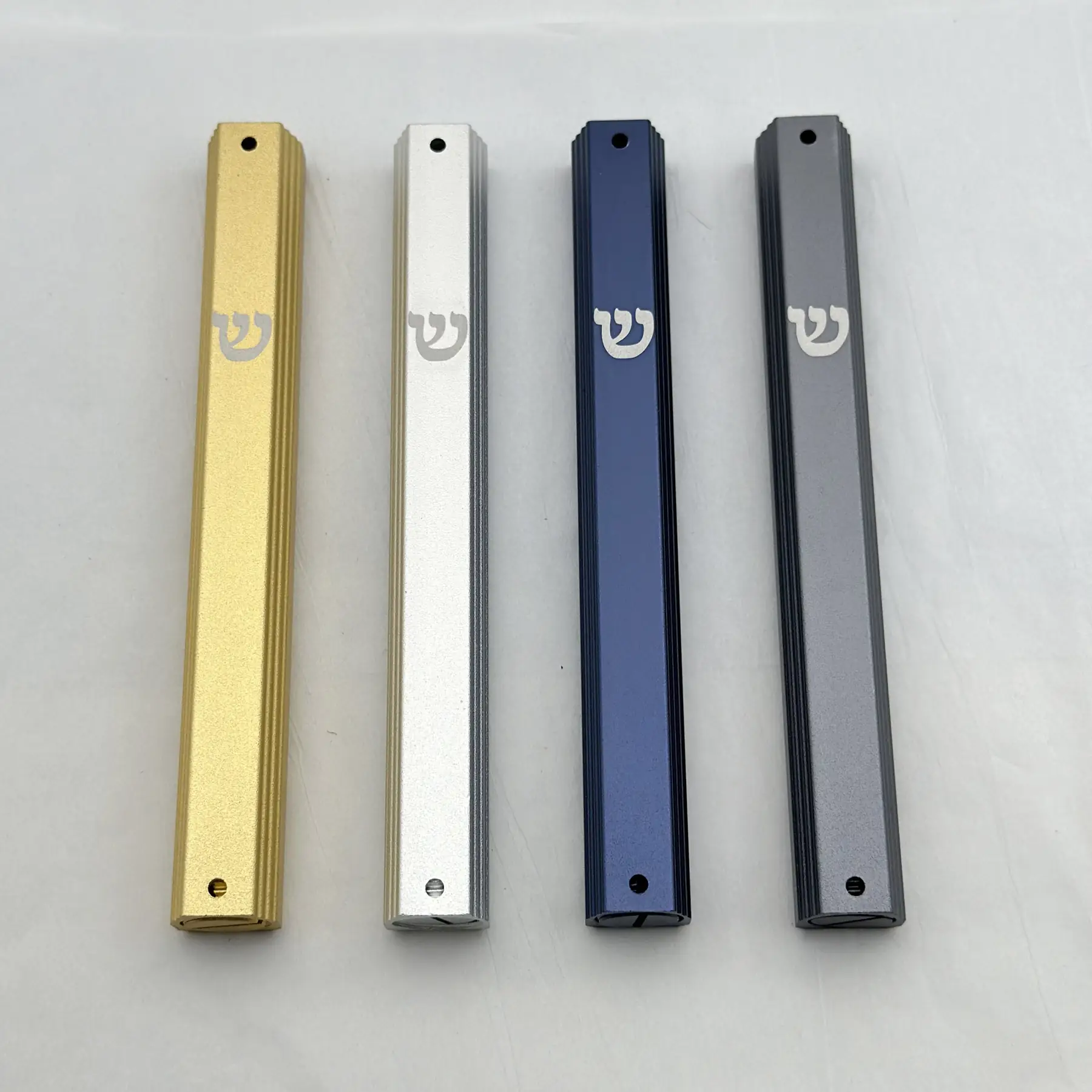 Close view of the screw-open bottom on the aluminium mezuzah