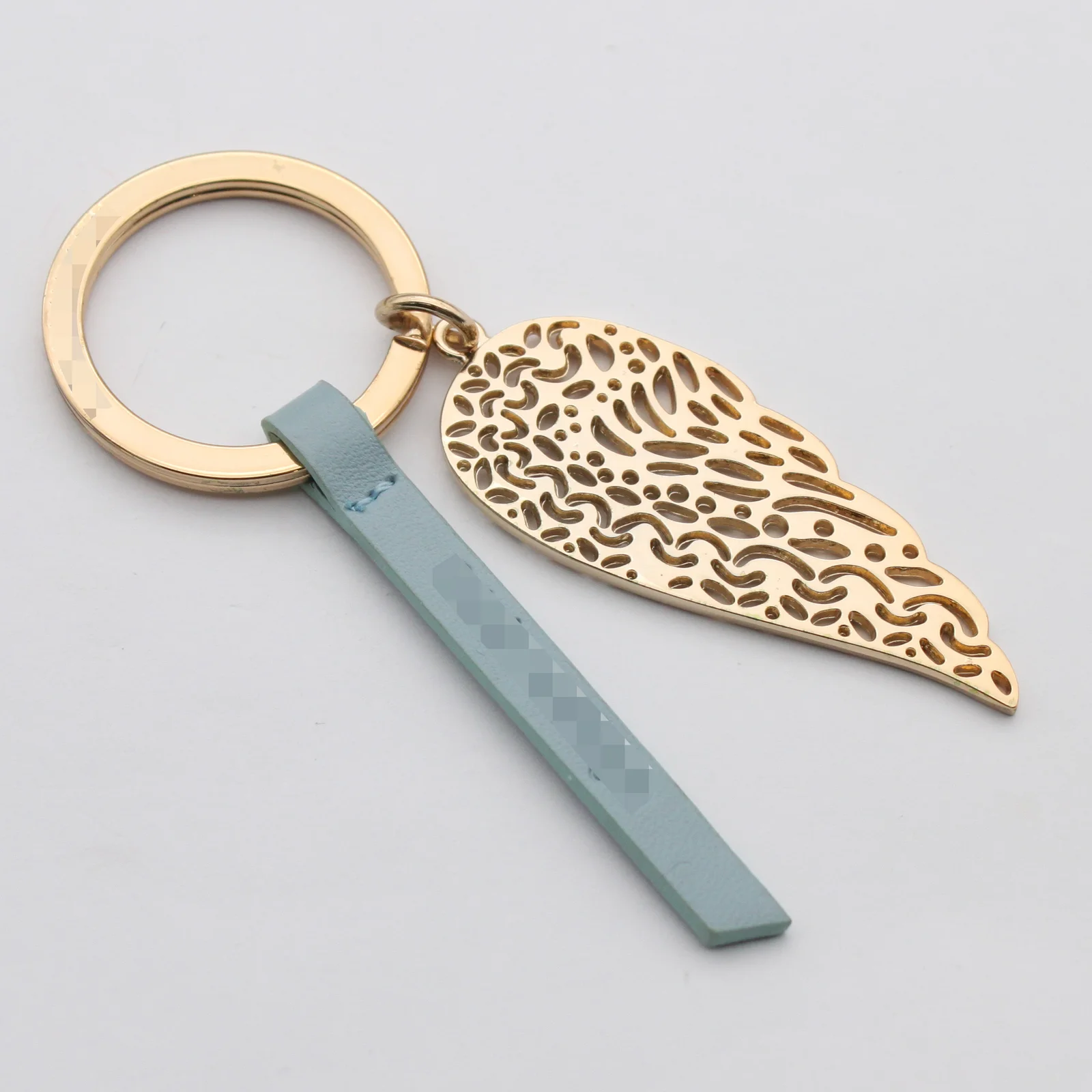 Angel wing keyring shown from the front