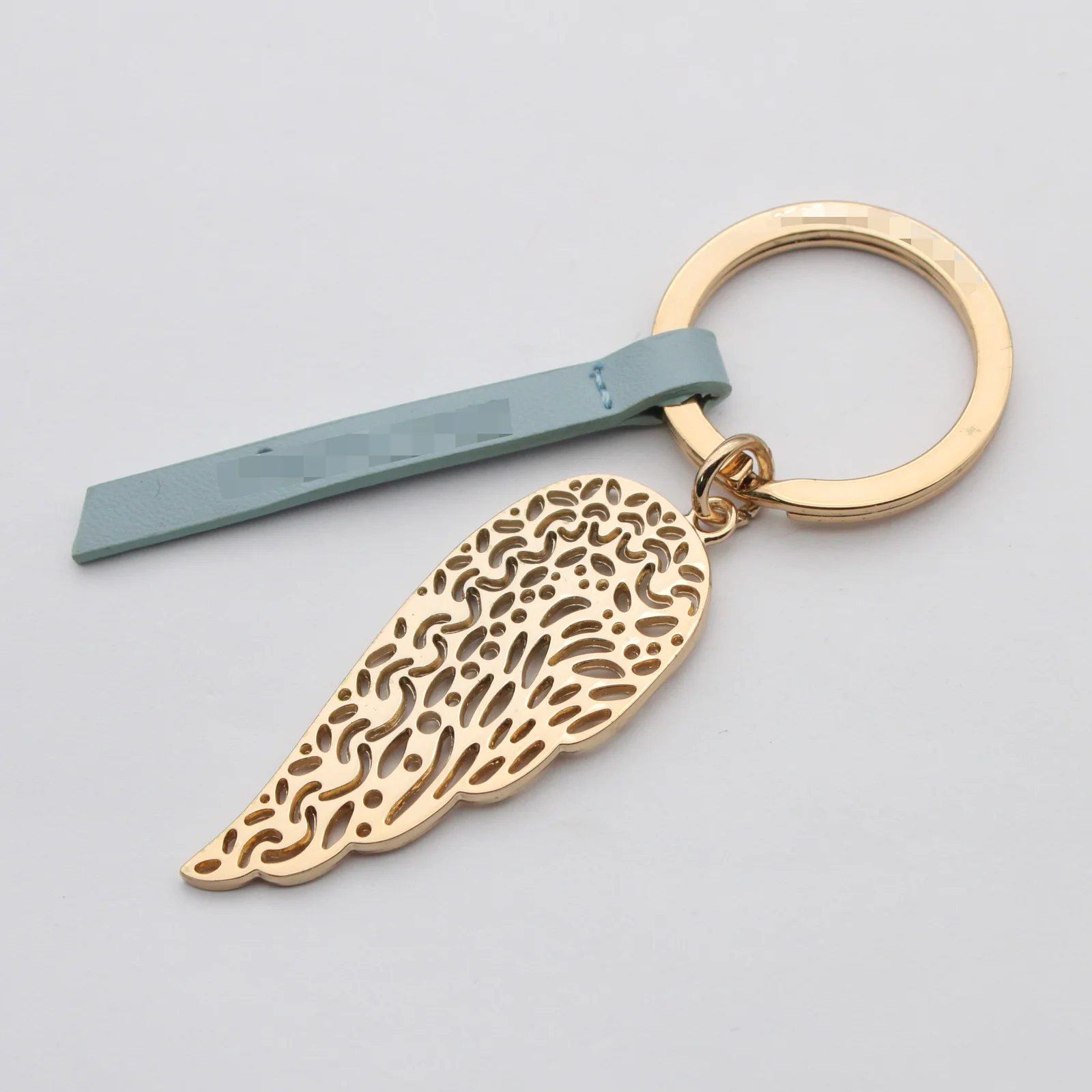 Reverse of the angel wing keyring showing the second face