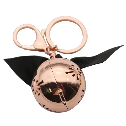 Round essential oil diffuser keyring with hollowed logo