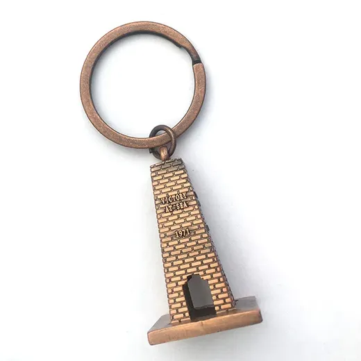 Antique brass Victory At Sea Memorial souvenir keychain