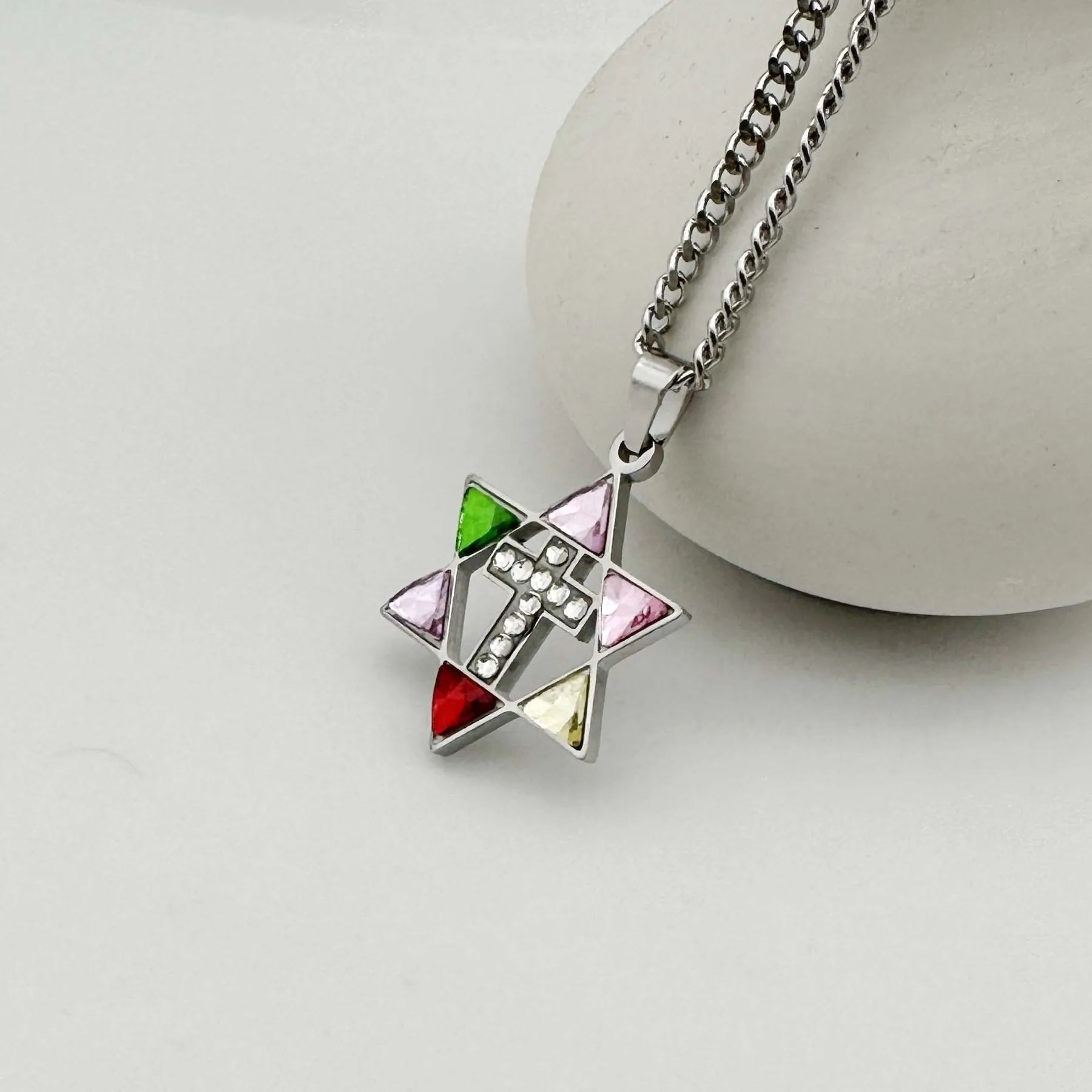 Star of David cross pendant shown with its chain