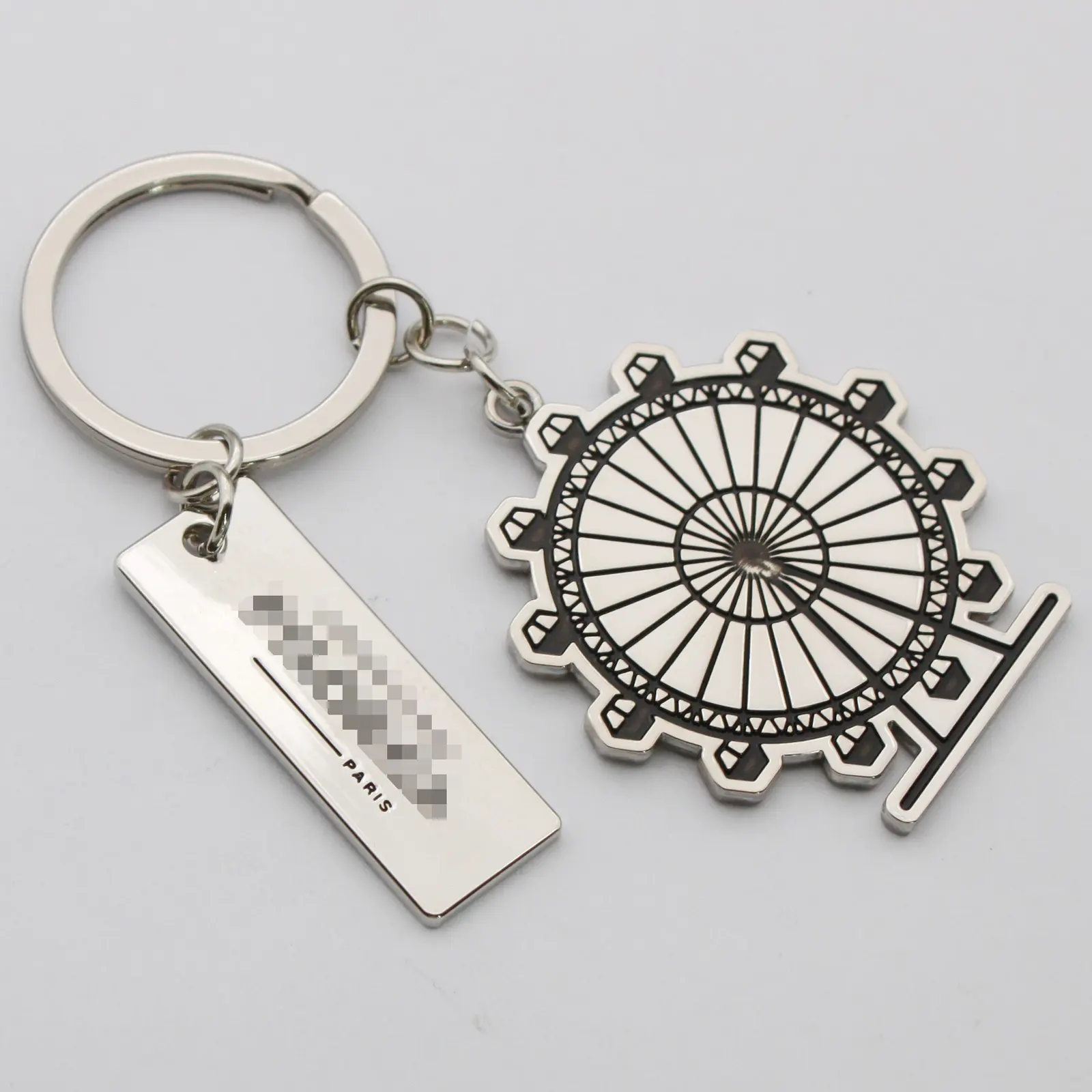 Close view of the enamel and lattice detail on the Ferris wheel keyring