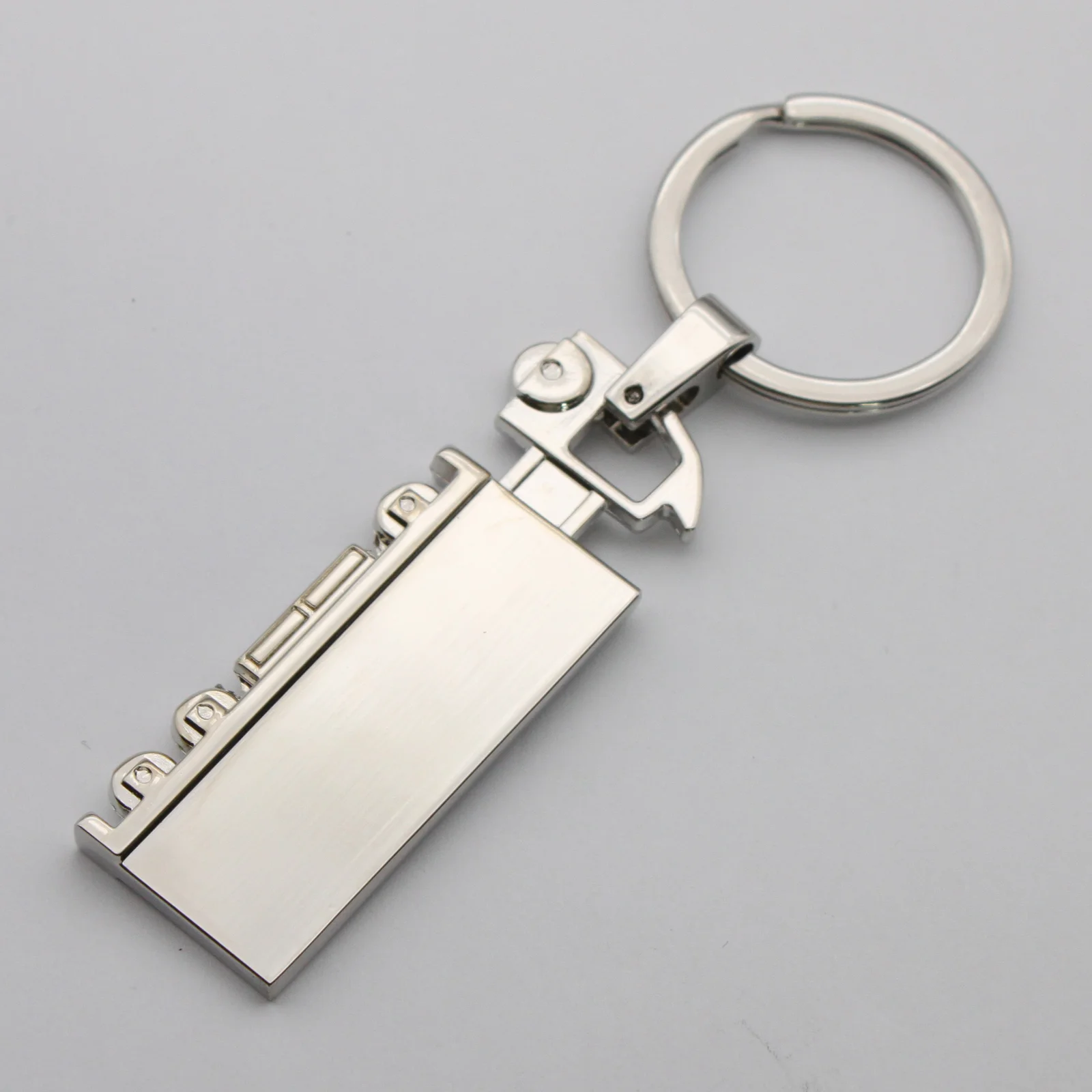 Close view of the laser etched logo on the lorry keyring