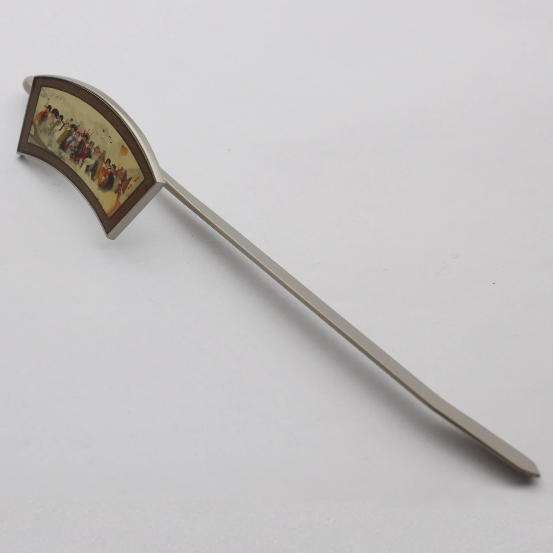 Custom metal bookmark shown full length