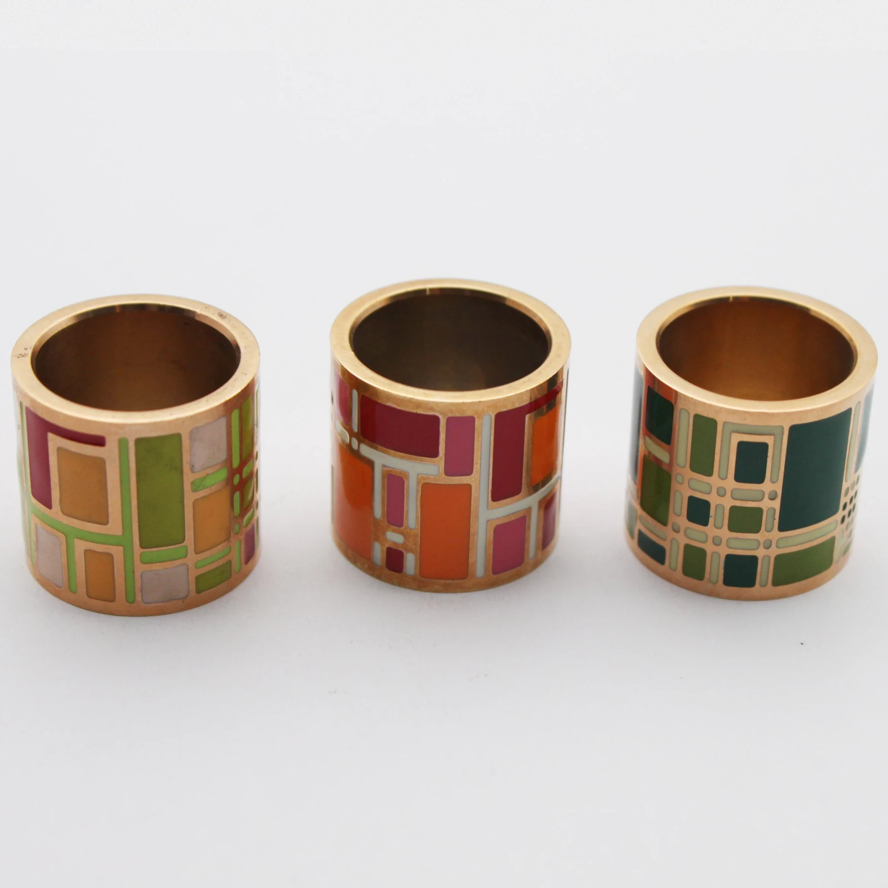 Close view of the enamel detailing on the gold plated napkin ring