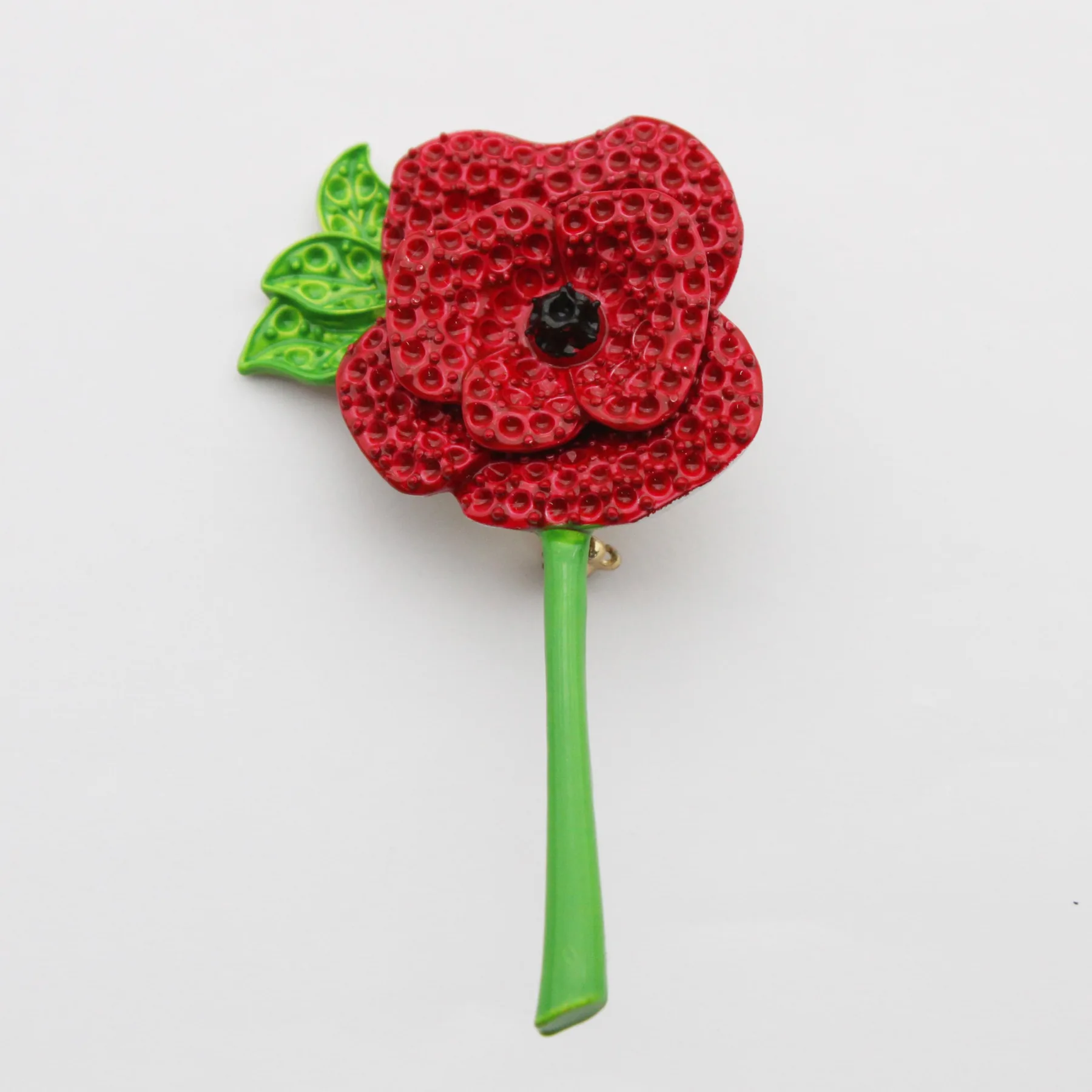 Poppy lapel pin shown from the front