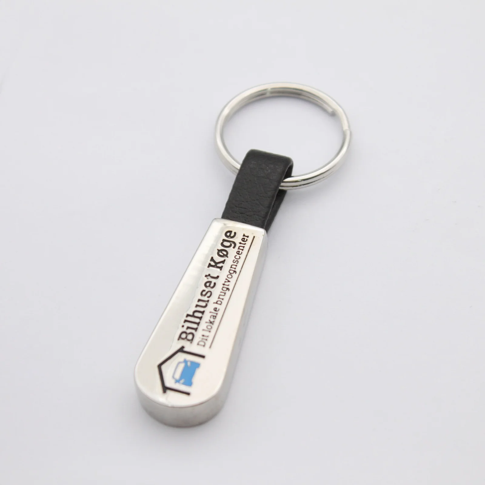 Reverse of the teardrop keyring showing the second branding face