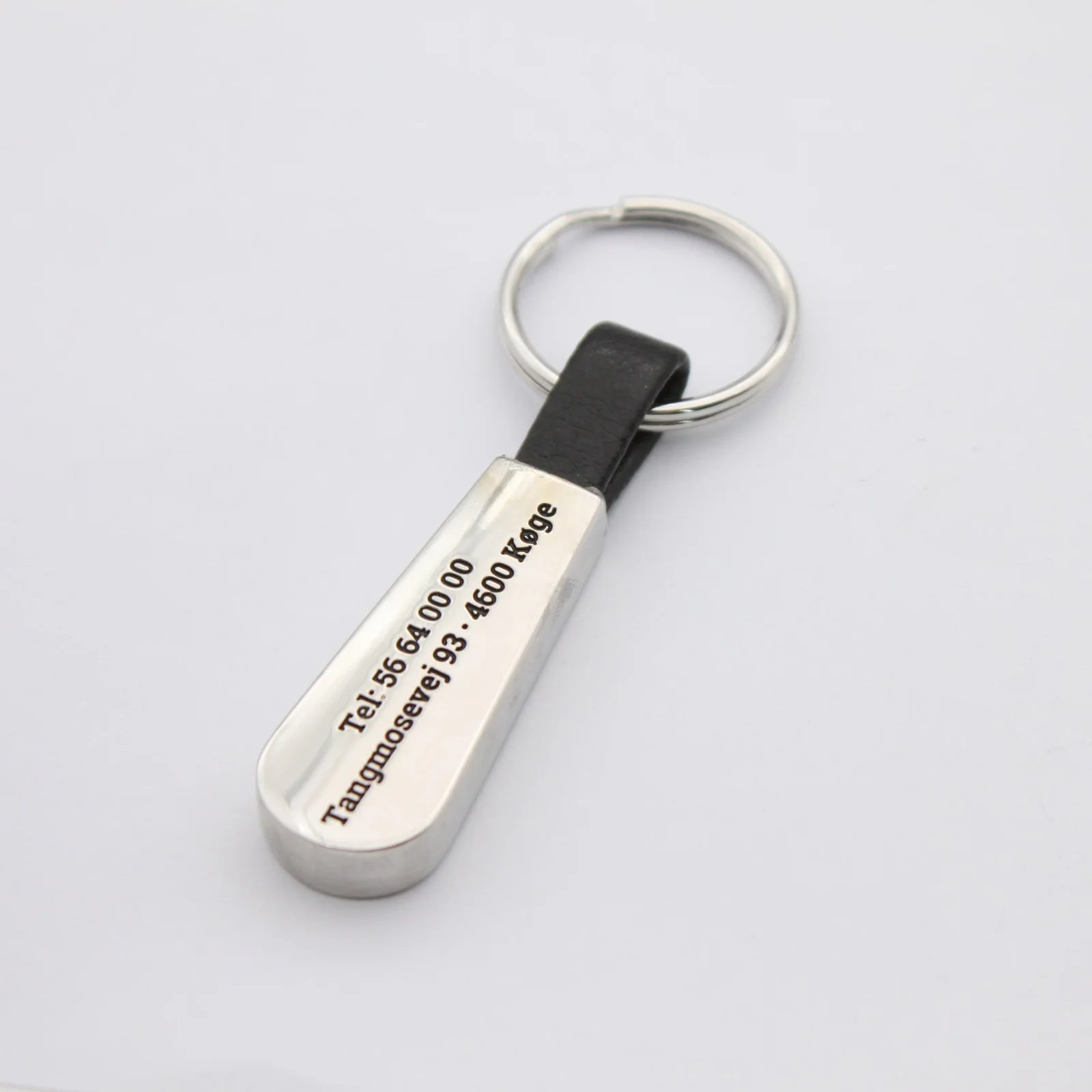 Custom teardrop keyring shown from the front