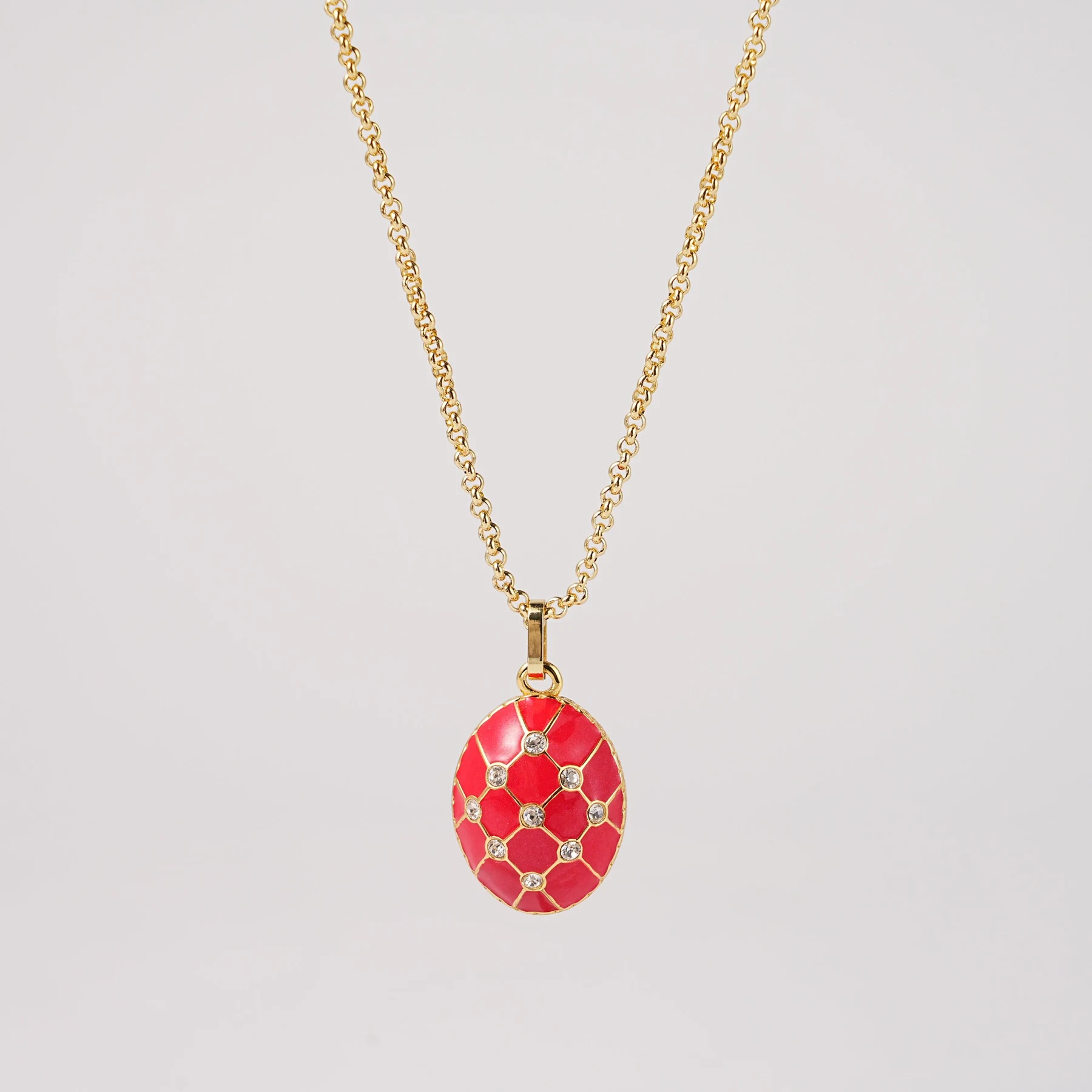 Close view of the enamel and stone work on the Easter egg pendant