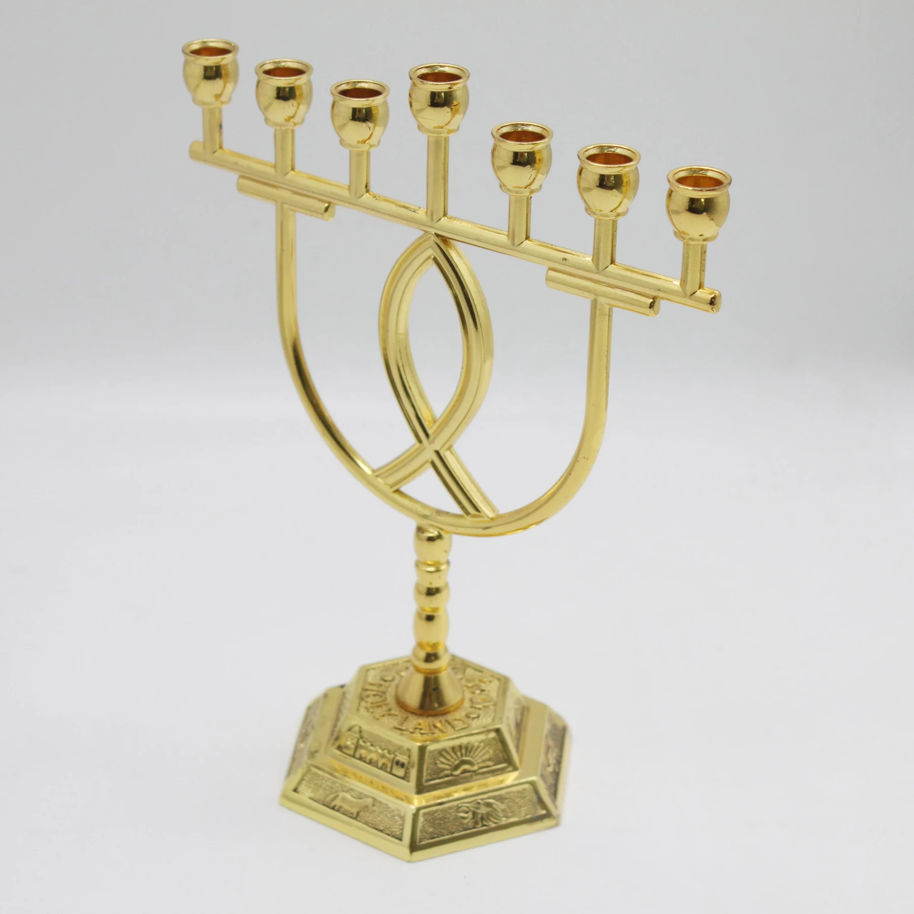 Fish design Temple menorah shown on its hexagonal base