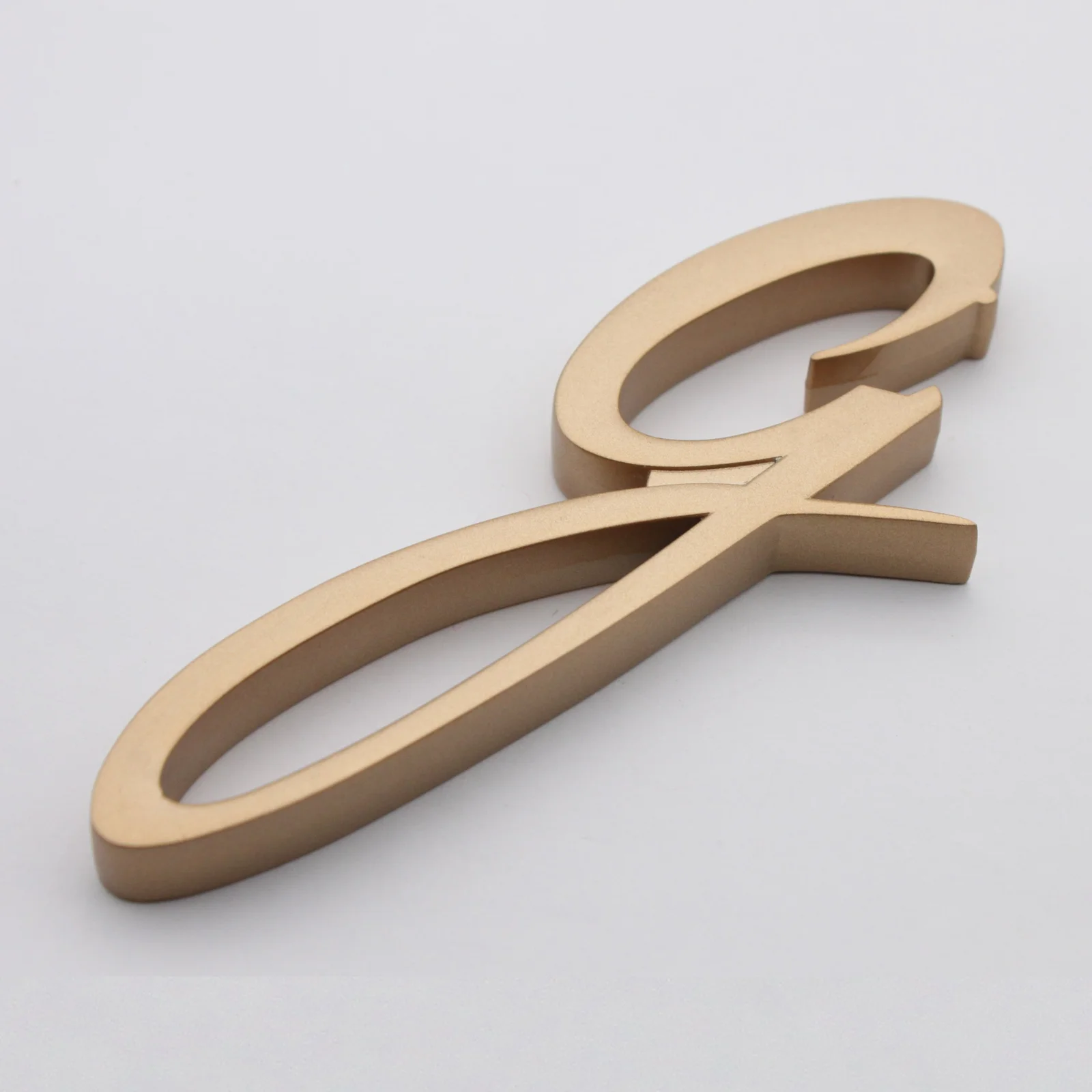 Custom letter bottle opener shown from the front