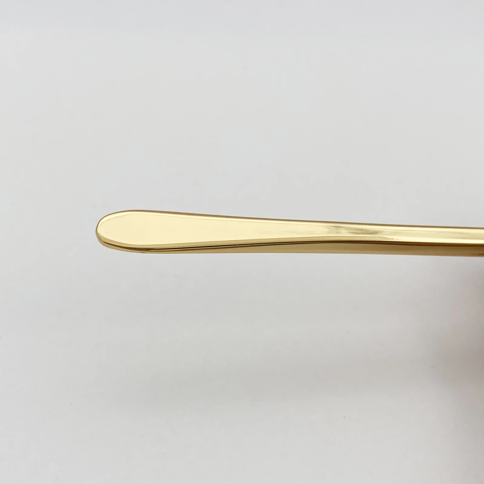 Close view of the high gloss gold plated finish