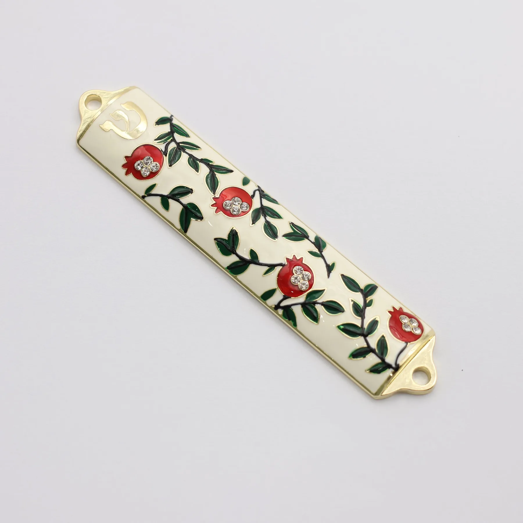 Pomegranate design mezuzah shown from the front
