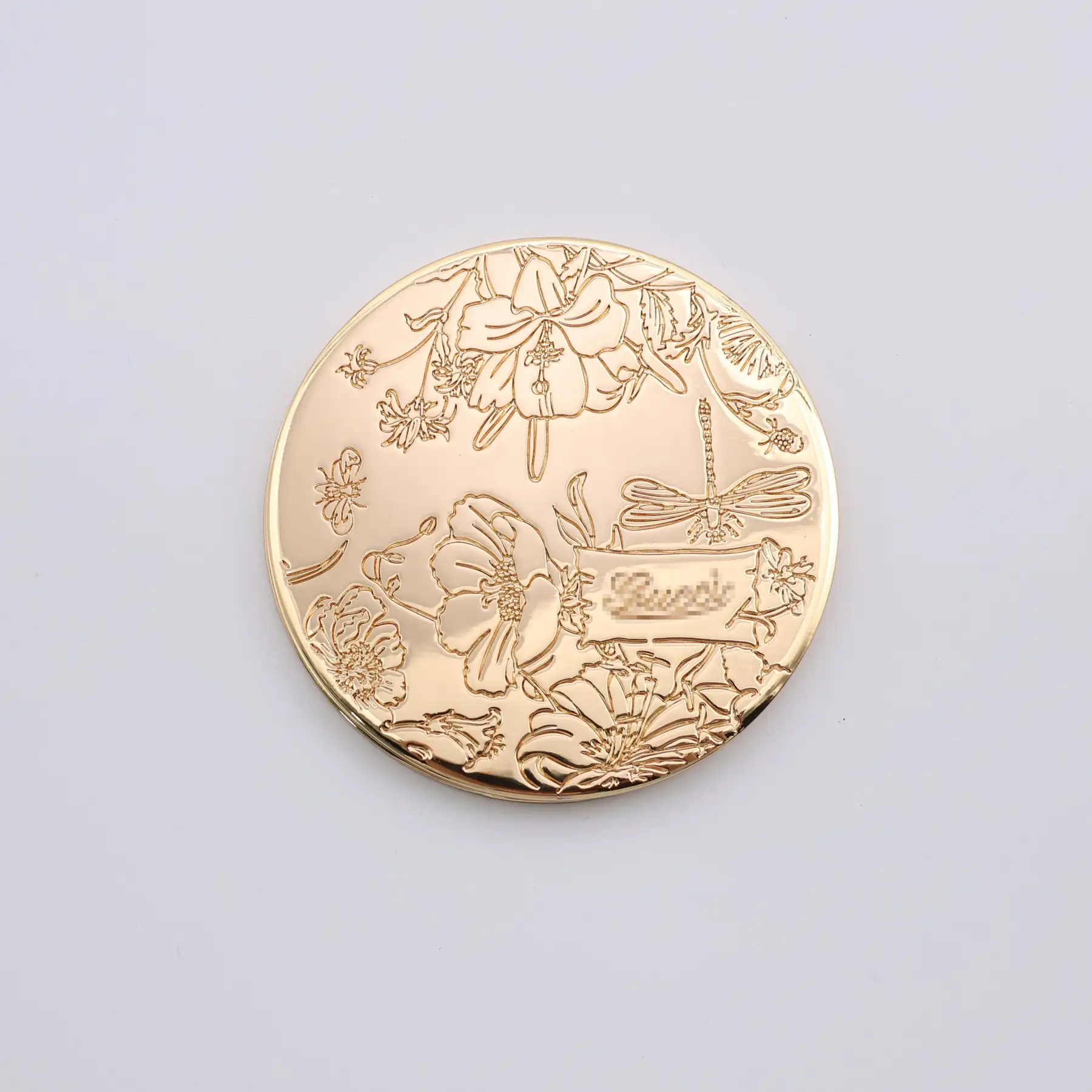 Gold plated portable mirror with floral engraving