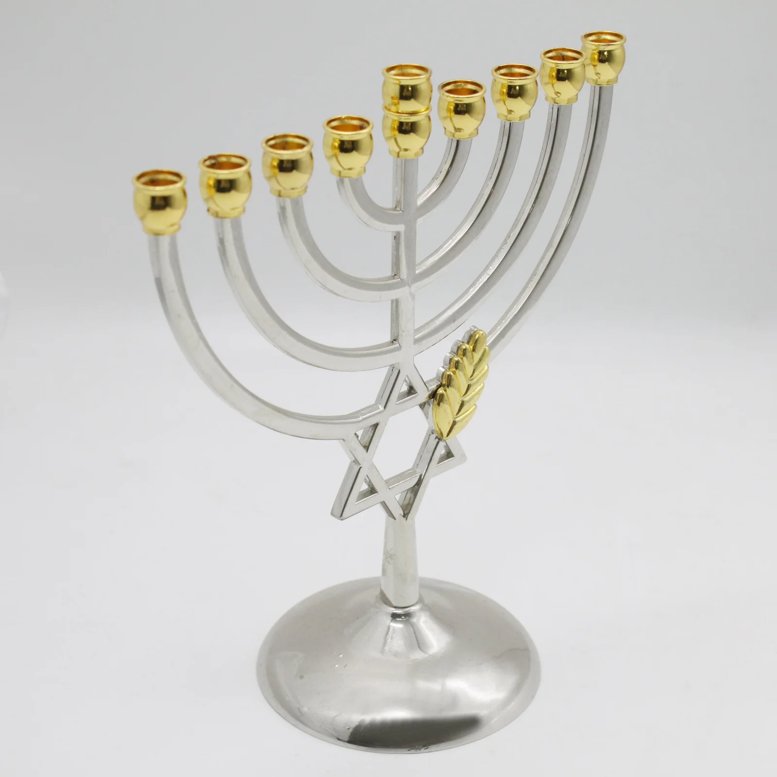 Angled view of the silver plated Hanukkah menorah with gold leaf detail