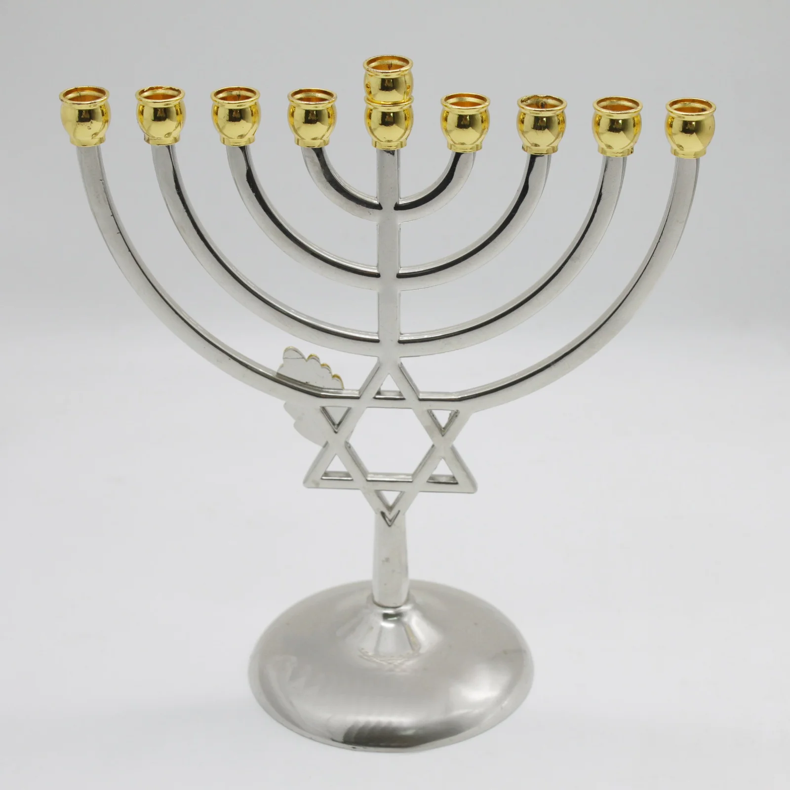 Close view of the gold plated leaf and candle holder detail