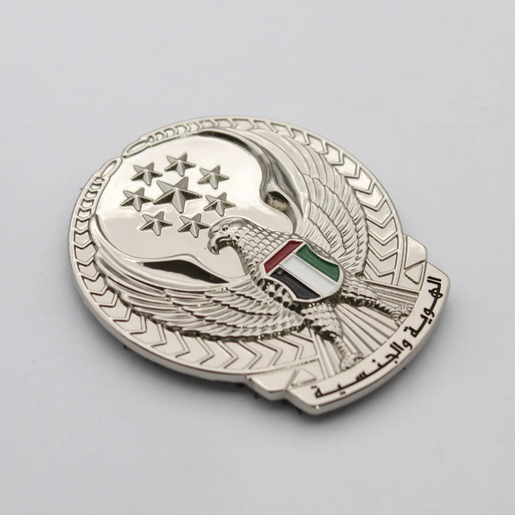 Cap badge shown from the front