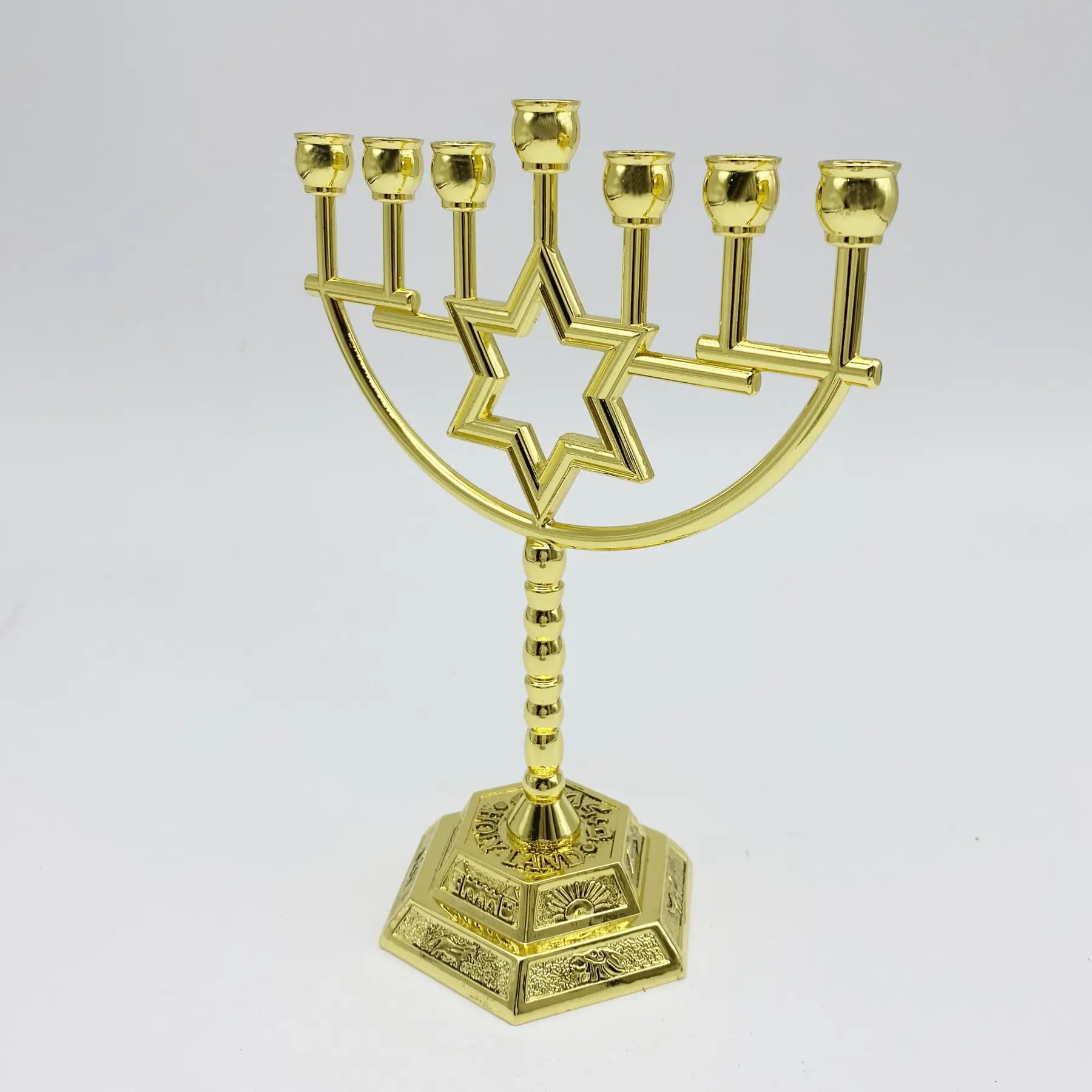 Angled view of the gold plated Magen David menorah