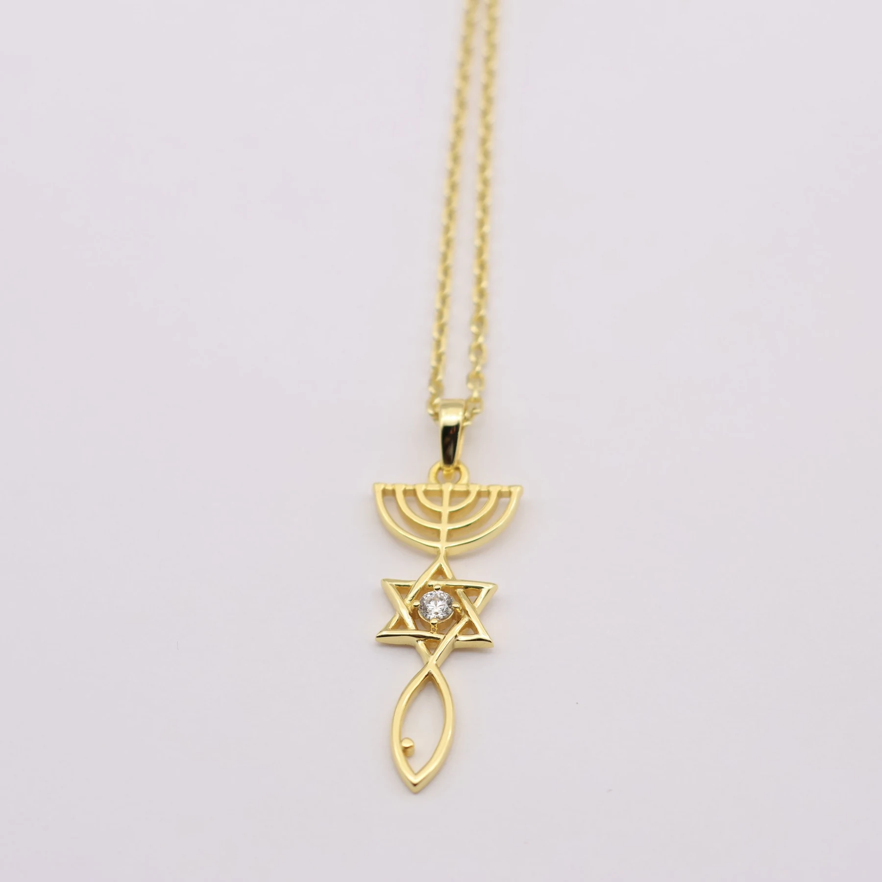 Close view of the Messianic Seal charm and set rhinestone