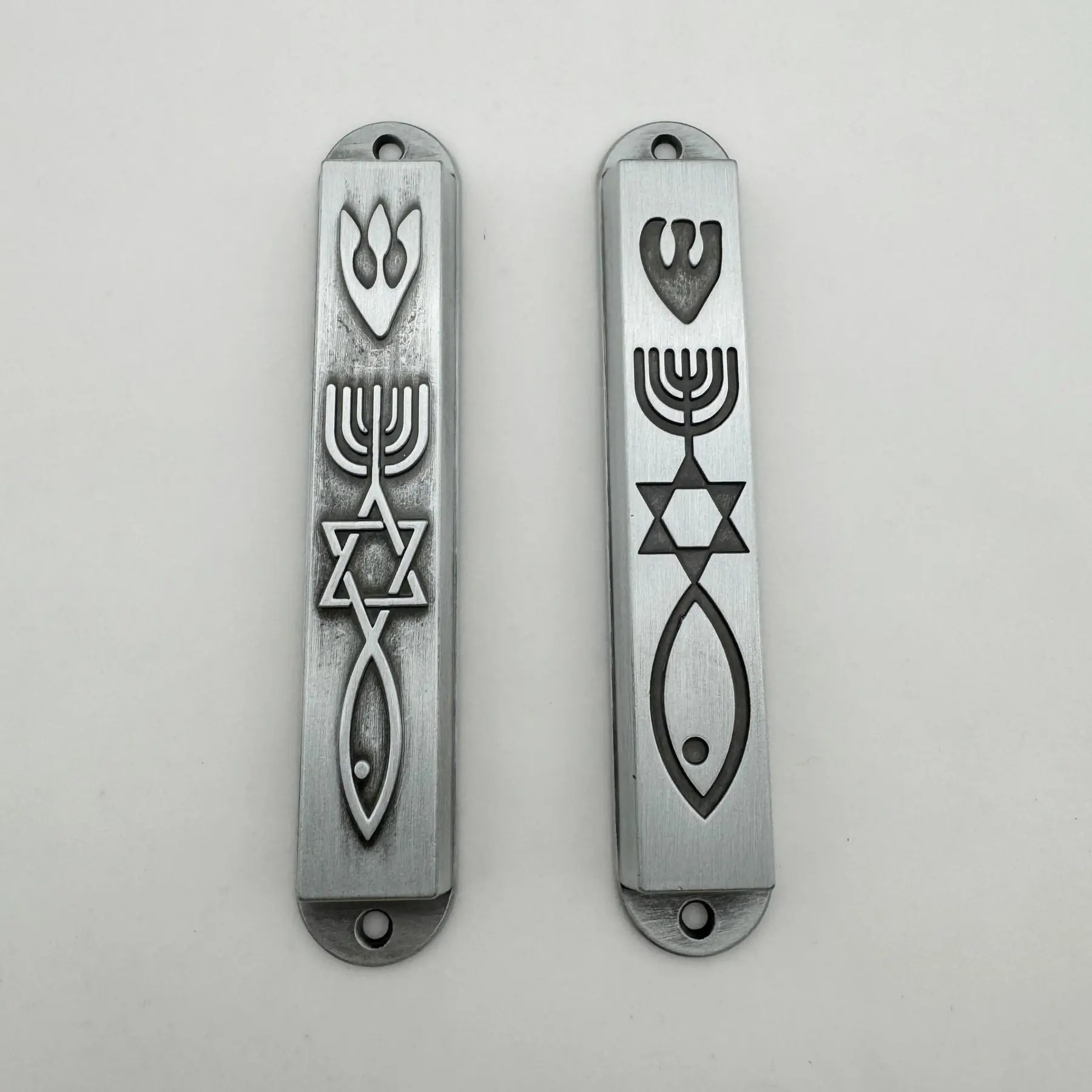 Recessed and debossed styles of the Messianic Seal mezuzah