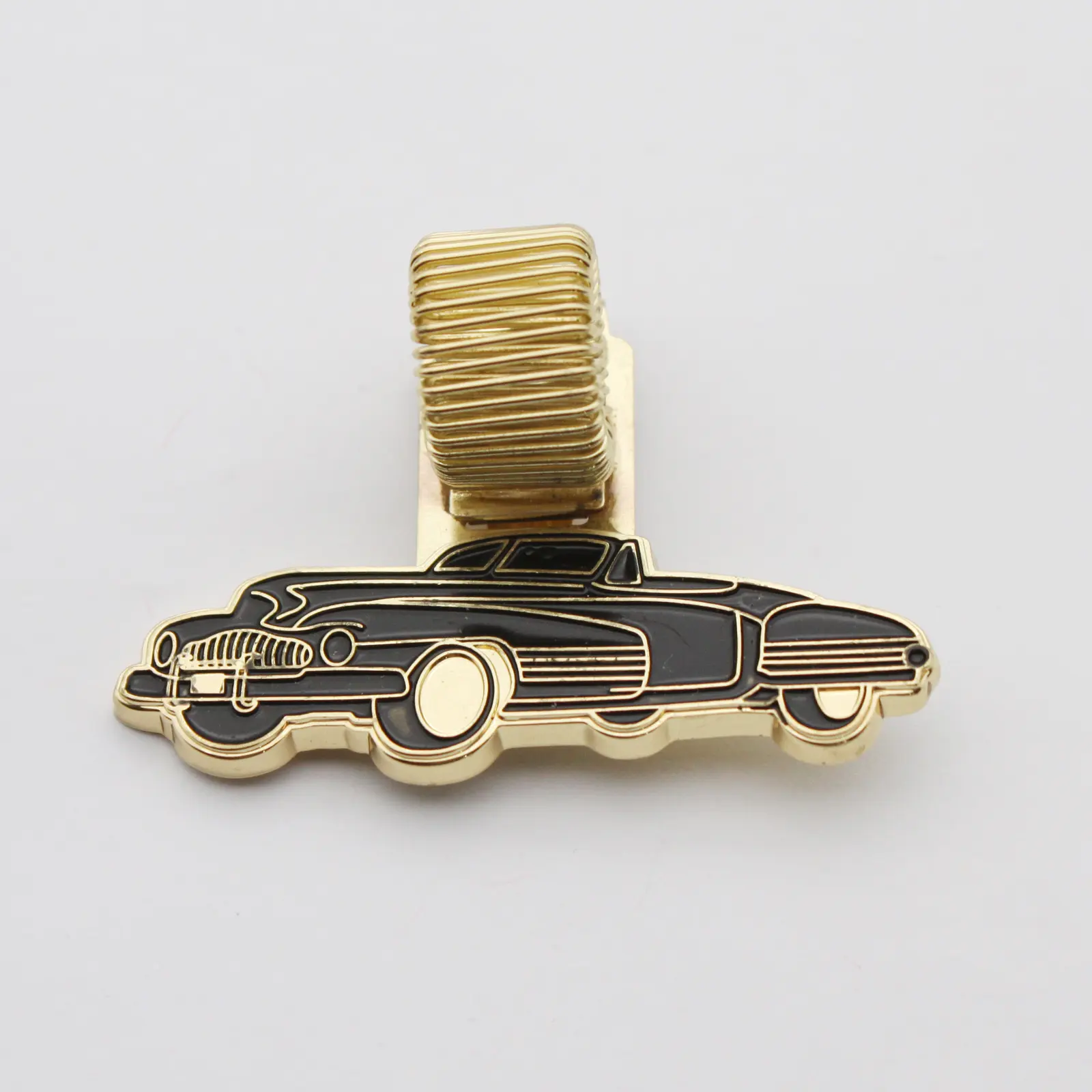 Pen holder clip shown holding a pen