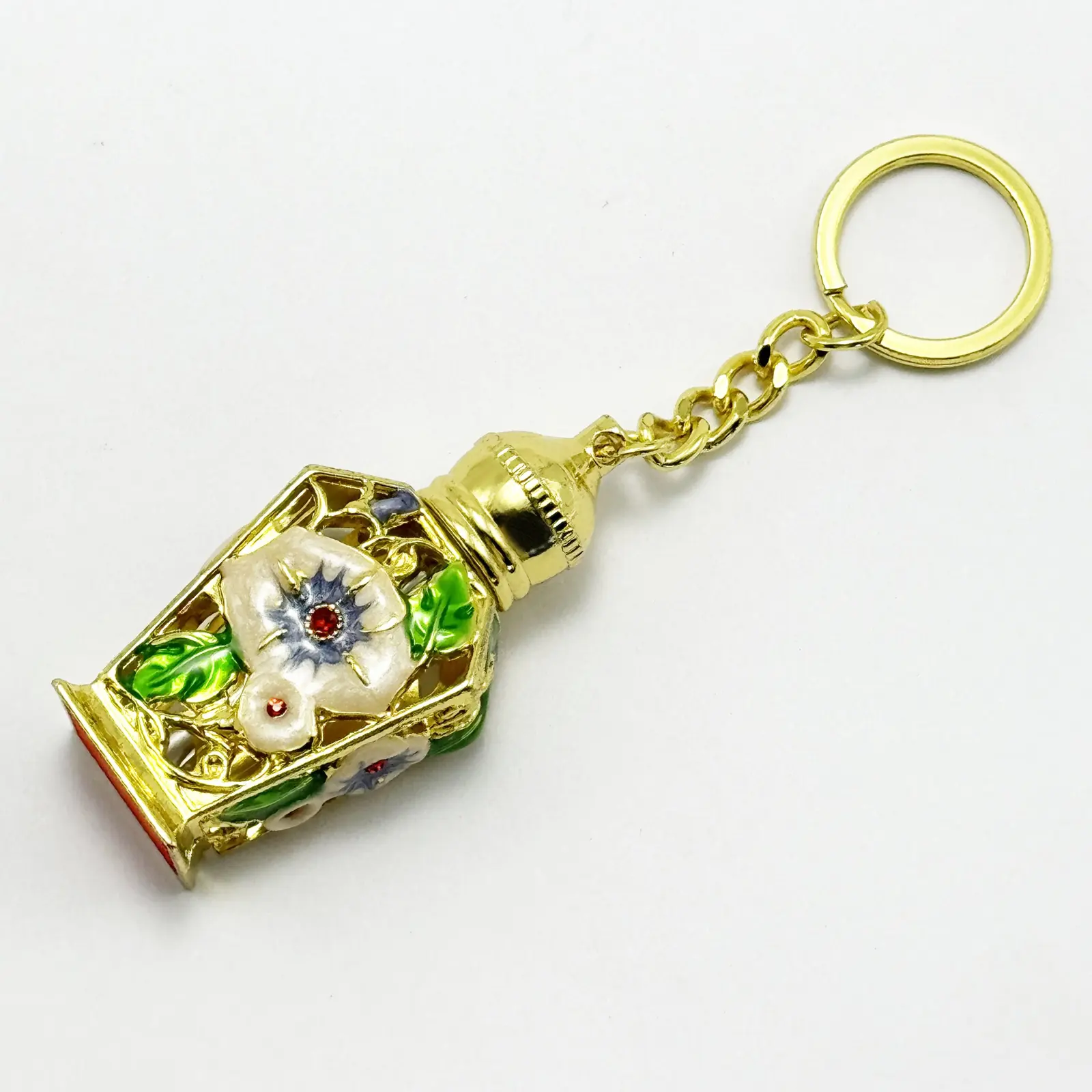 Gold plated flower style perfume bottle keyring with enamel