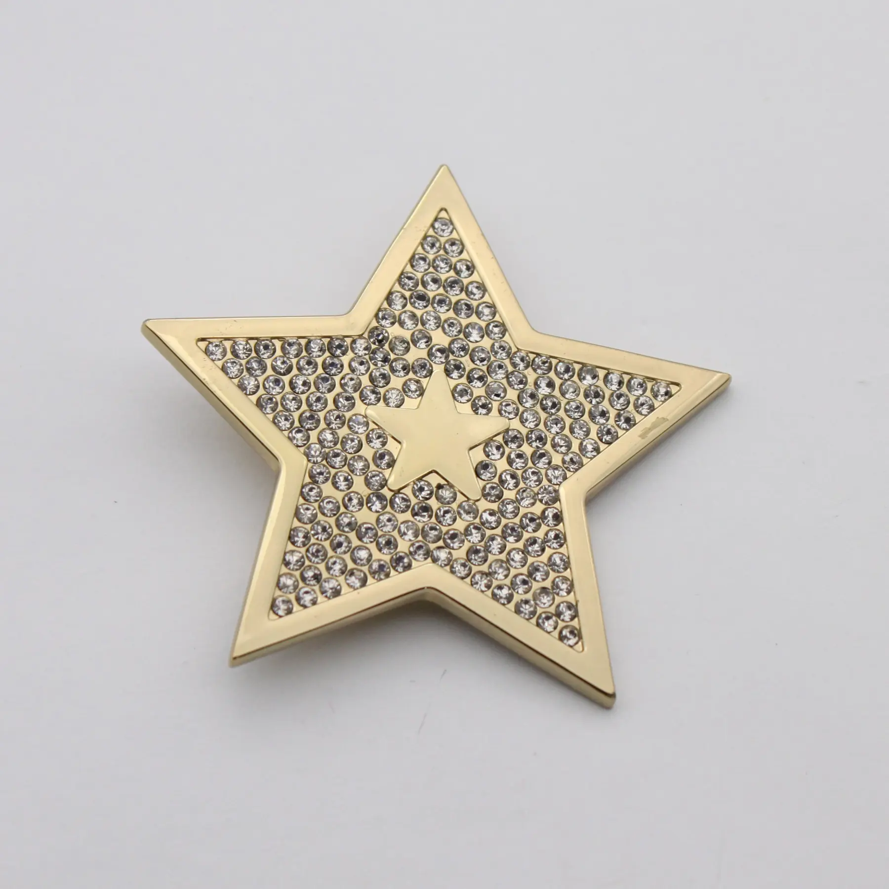Close view of the set stones on the star lapel pin