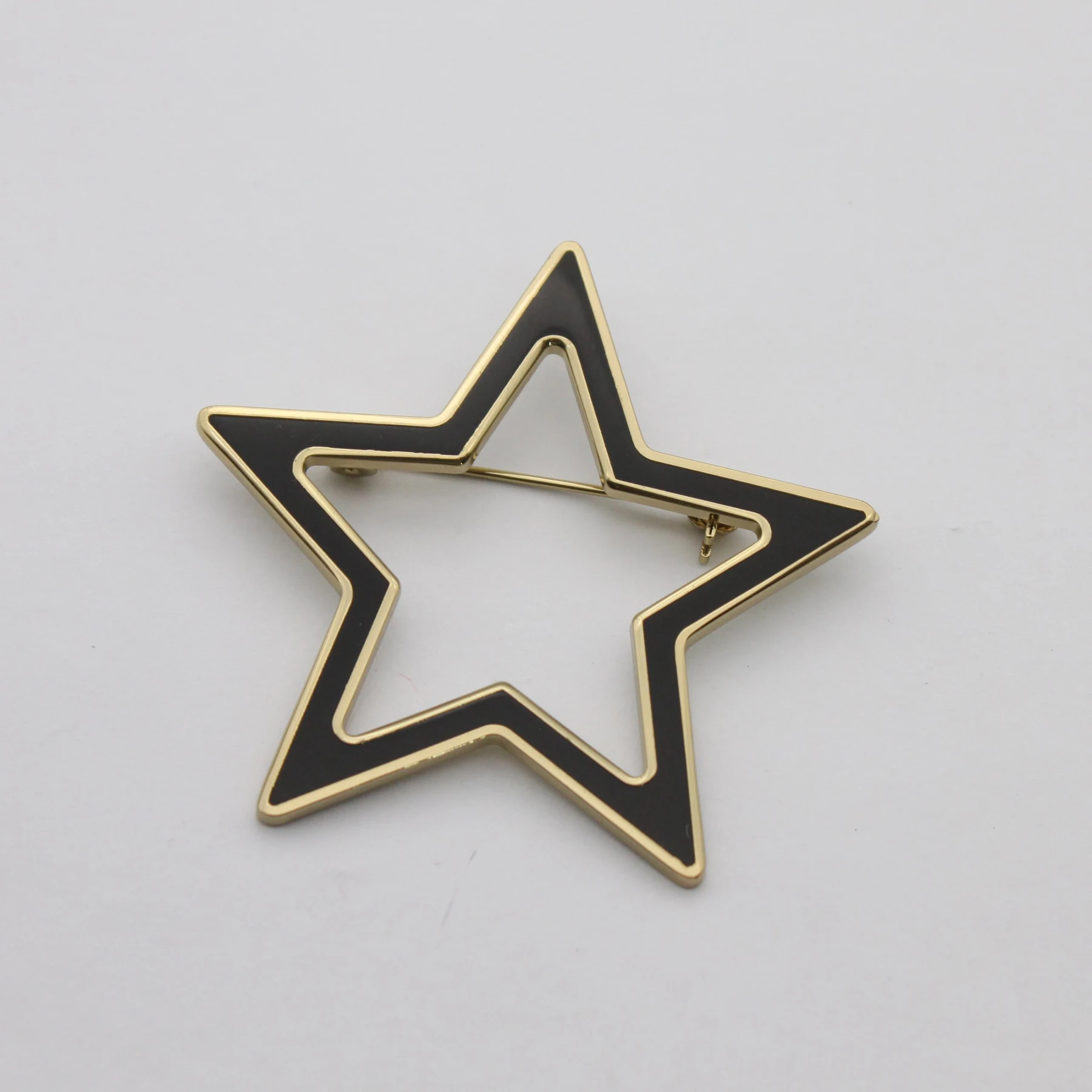 Reverse of the star lapel pin showing the pin fitting
