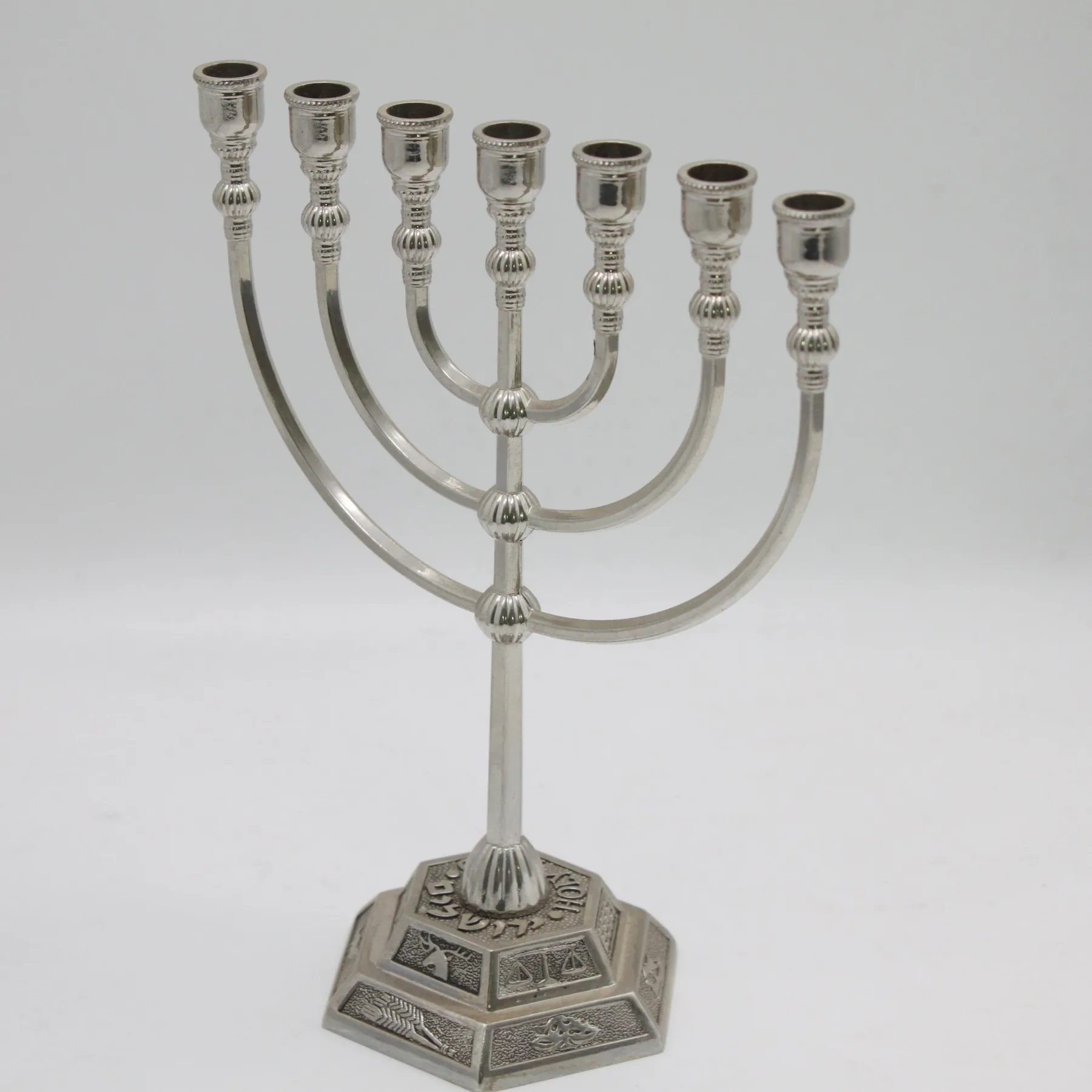Temple design menorah shown from the front on its hexagonal base