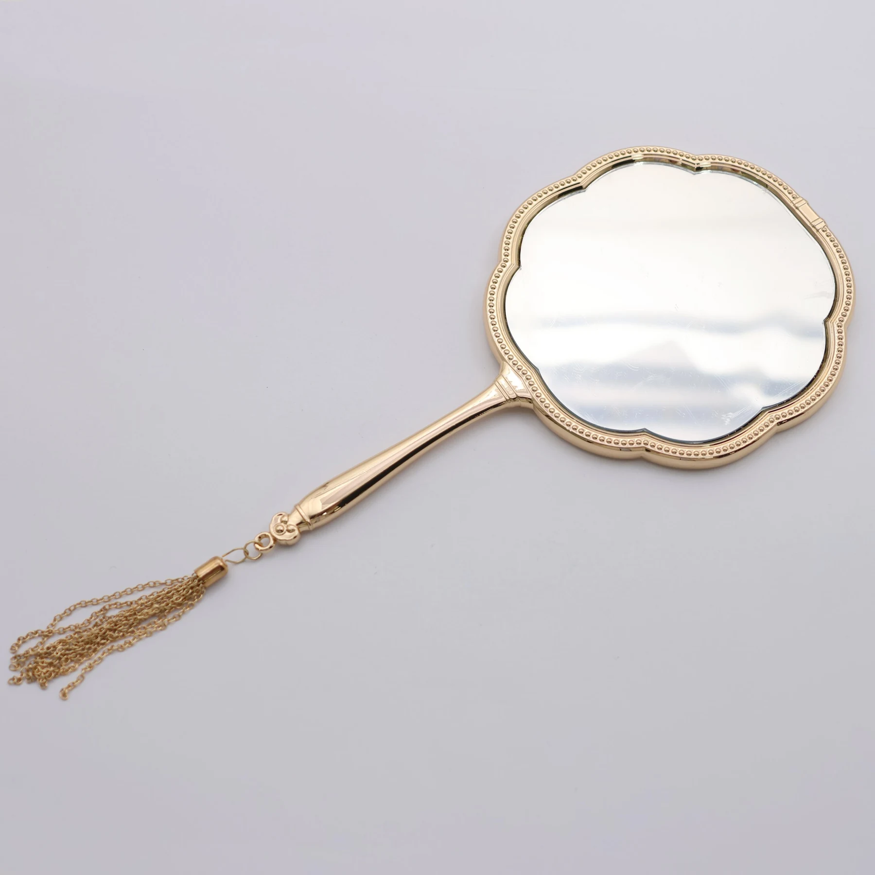 Close view of the UV printed colour detail on the metal mirror