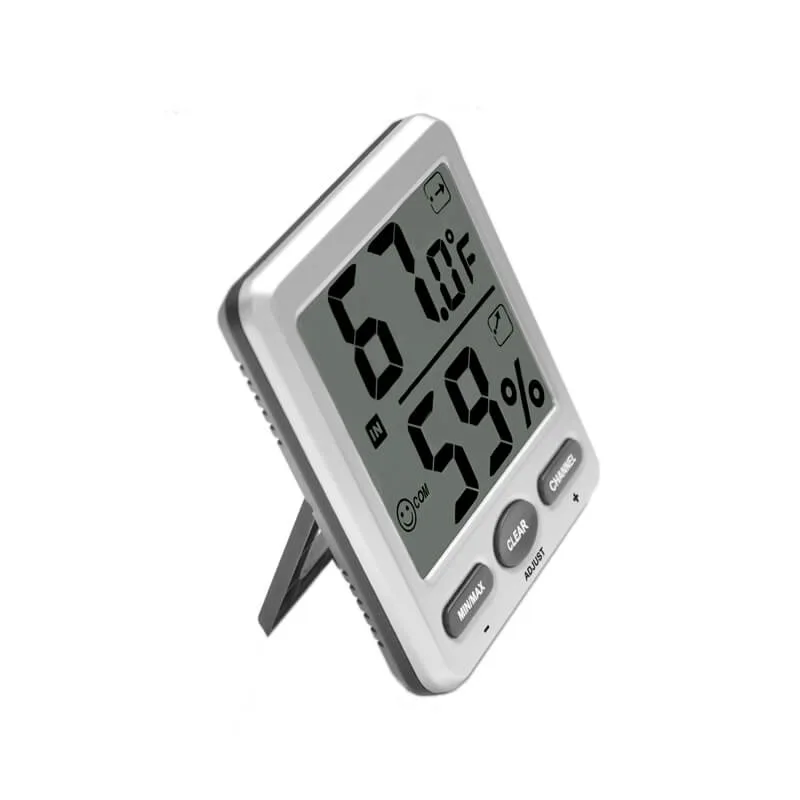 FT007 remote sensor mounted on a wall with battery compartment open
