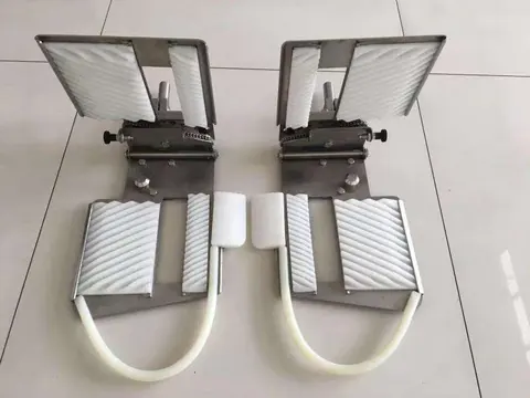 Conjunto de dispositivo de fijación y desenrollador de orillos de nailon