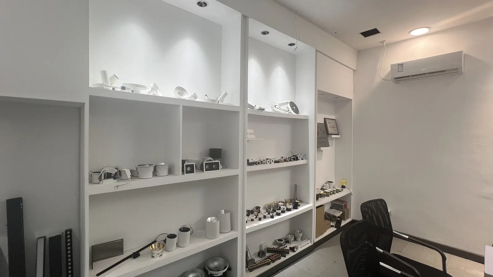 Showroom display of recessed spotlights and downlights